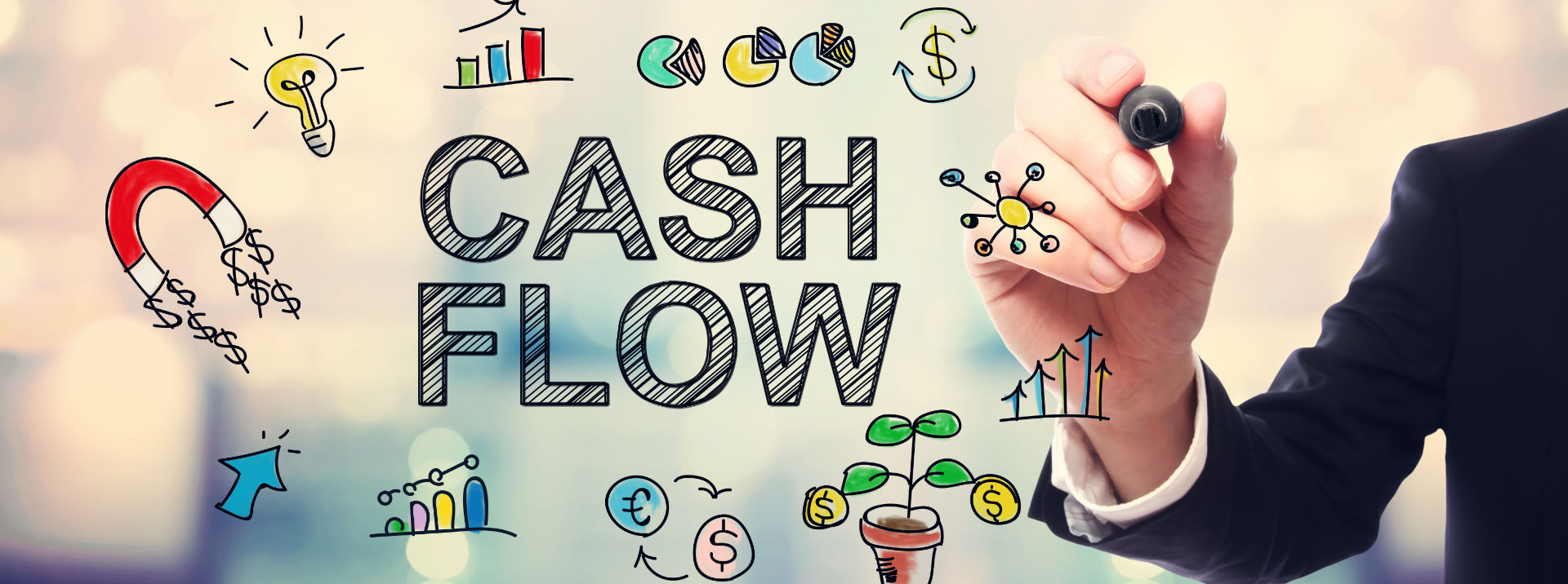 Business Banking - Cash flow infographic with a man’s hand holding a black marker | Ozark Bank